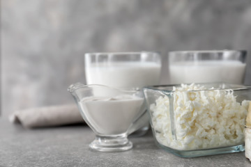 Different milk products on grey  background