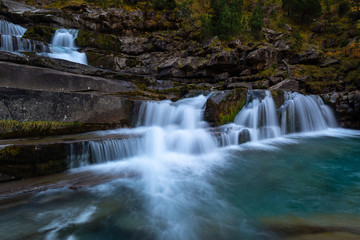 Fototapeta na wymiar Gradas of Soaso, Falls on Arazas River , Ordesa National Park, Huesca, Spain
