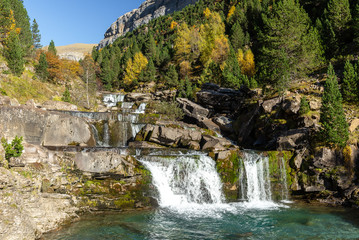 Fototapeta na wymiar Gradas De Soaso, Falls on Arazas River , Ordesa National Park, Huesca, Spain