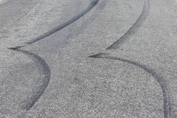 Tyre skid marks on asphalt road
