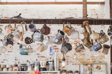 coffee cups hanging in cafe,kitchen decoration