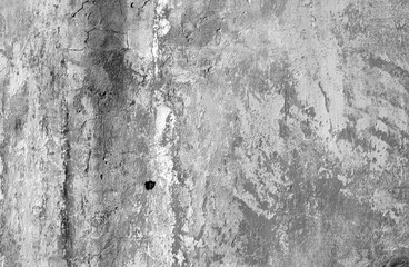 Grungy cement wall texture in black and white.