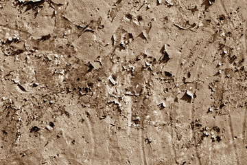 Grungy cement wall texture in brown tone.