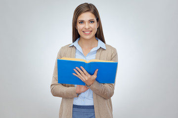 Obraz premium Smiling woman holding open book.