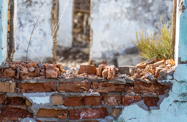 fragment of destroyed brick wall