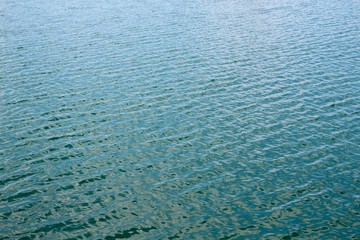 A close up view of the ripples and the waves in the water.