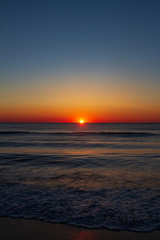 Sonne versinkt im Meer