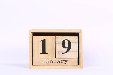 Wooden cubes calendar with the date of January 19. Concept calendar for year with copy space...