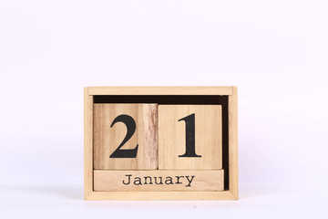Wooden cubes calendar with the date of January 21. Concept calendar for year with copy space...