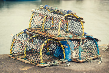 Fishing traps, lobster pots at harbor