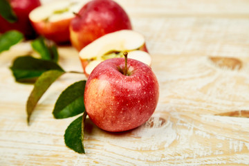 Fresh red ripe apples fruits whole and sliced