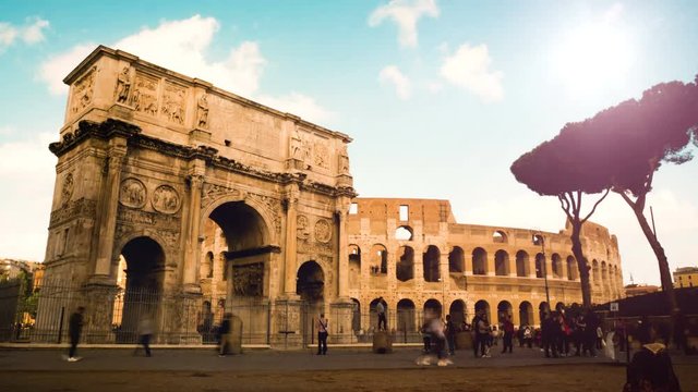 timelapse on a windy day at the Arch of Constantine, triumphal arch near the Colosseum in the center of Rome