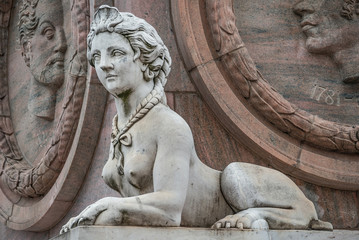 Statue of beautiful sphinx in downtown of Potsdam, Germany, portrait, details