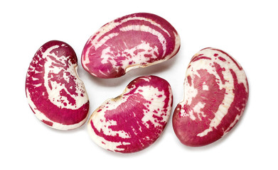 Purple string beans on white background