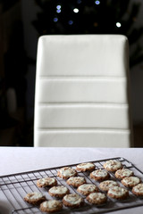 Pile of oatmeal, cranberry and white chocolate cookies. Selective focus.
