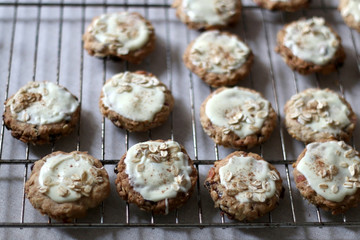 Pile of oatmeal, cranberry and white chocolate cookies. Selective focus.

