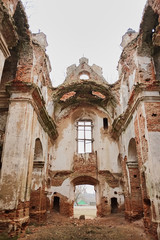 Fototapeta na wymiar ruins of an old ruined church. red brick, ruined arches