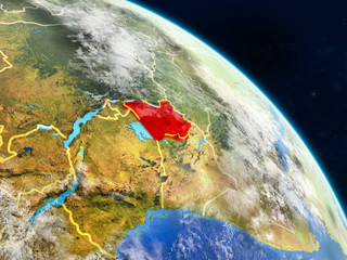 Uganda from space on realistic model of planet Earth with country borders and detailed planet surface and clouds.