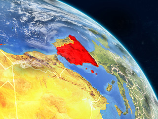 Spain from space on realistic model of planet Earth with country borders and detailed planet surface and clouds.