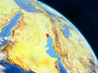 Kuwait from space on realistic model of planet Earth with country borders and detailed planet surface and clouds.