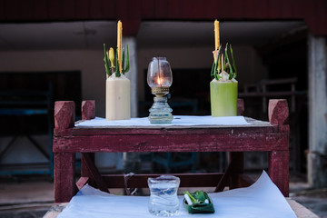 buddhist altar with candles and incense of buddha