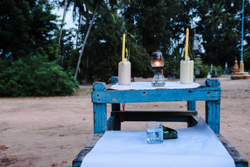 buddhist altar with candles and incense of buddha