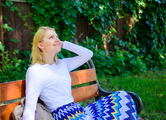 Girl sit bench relaxing in shadow, green nature background. Why you deserve break. Ways to give...