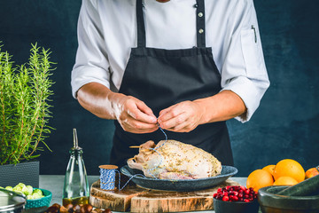 Chef preparing stuffed duck