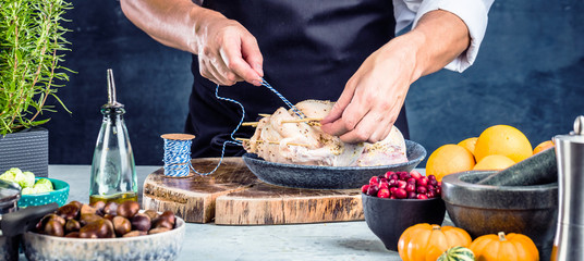 Chef preparing stuffed duck