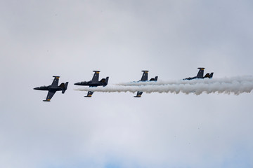 Aerobatic team Russ on aircraft L-39 Albatross performs the program at the air show