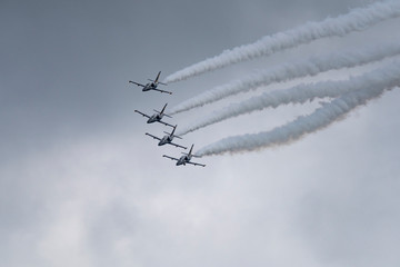 Aerobatic team Russ on aircraft L-39 Albatross performs the program at the air show