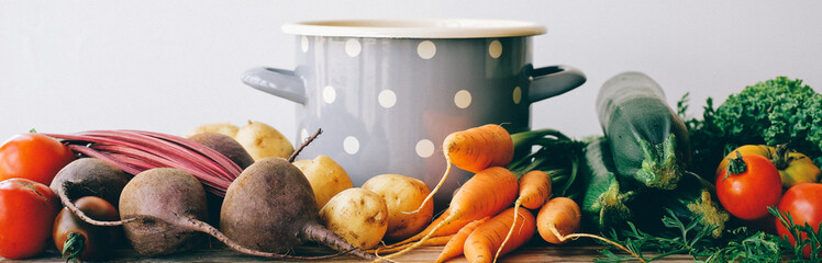 Casserole and Various Autumn vegetables.  Organic farm products. Banner size