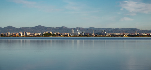 Fototapeta na wymiar Valencia city skyline and albufera rice fields
