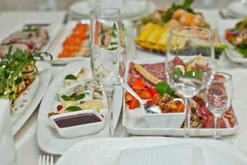 delicious dishes on the table in the restaurant. serving table.