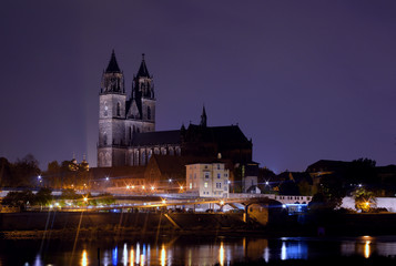 Fototapeta na wymiar Magdeburg Germany by night cityscape over the river Elbe