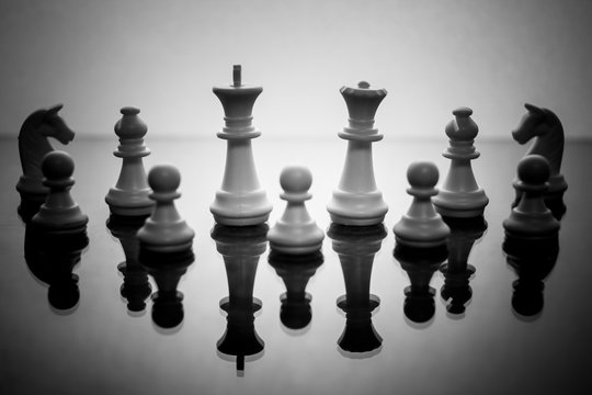 King of a chess game isolated on a white background symbol of a leader