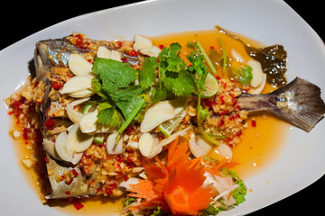 Steamed sea bass with lime sauce Thai style