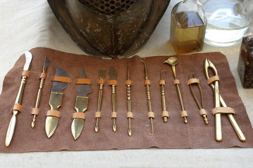 Various ancient Roman scalpels and other surgical instruments made from brass and steel