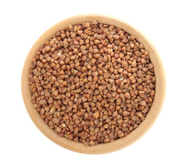 Buckwheat groats in a wooden bowl on a white isolated background. porridge. healthy food. cereals. top view