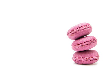 Delicious macaroons on white background