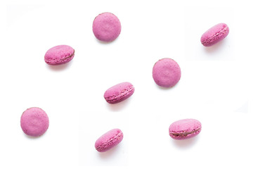 Delicious macaroons on white background
