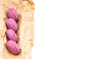Delicious macaroons on white background