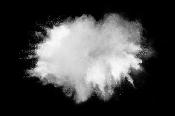 White powder explosion on black background. 