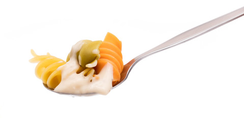 Pasta carbonara on spoon isolated on white background