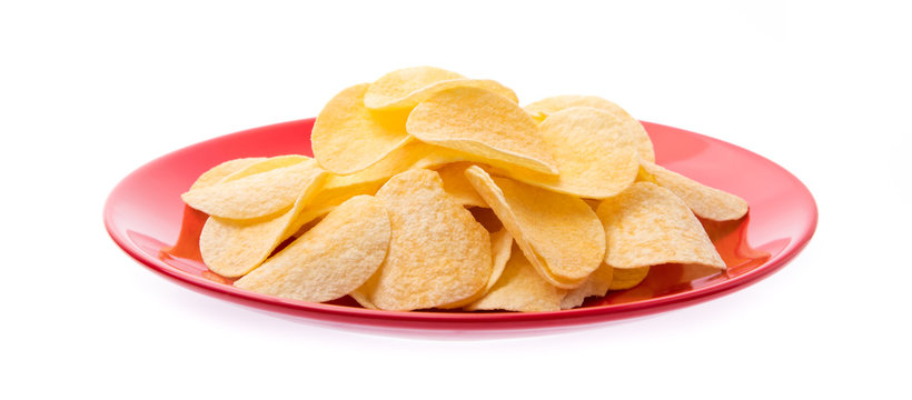 Potato chips on dish isolated on white background