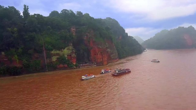 Aerial view of Leshan Buddha carved on mountain and Lingyun Shan Hill, Sichuan, China