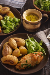 Chicken fillet baked with mozzarella and garlic butter. Served with roasted potatoes.