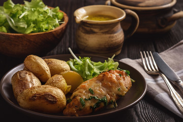 Chicken fillet baked with mozzarella and garlic butter. Served with roasted potatoes.