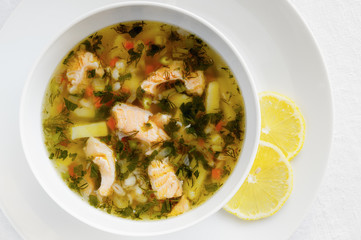 fish soup decorated with lemon slices