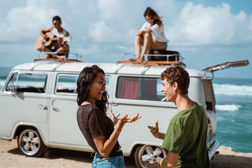 Hipster girl relaxing with friends